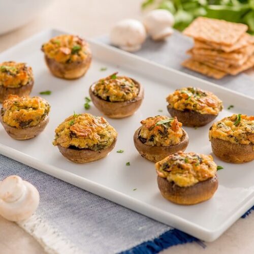 White cheddar stuffed mushrooms using Crunchmaster Multi-Grain crackers.