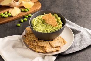 Crunchmaster Multi-Grain crackers with blended edamame dip.