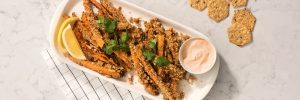 Sweet potato fried coated in Crunchmaster Multi-Seed crackers.