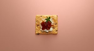 Crunchmaster cracker with a jelly topping.